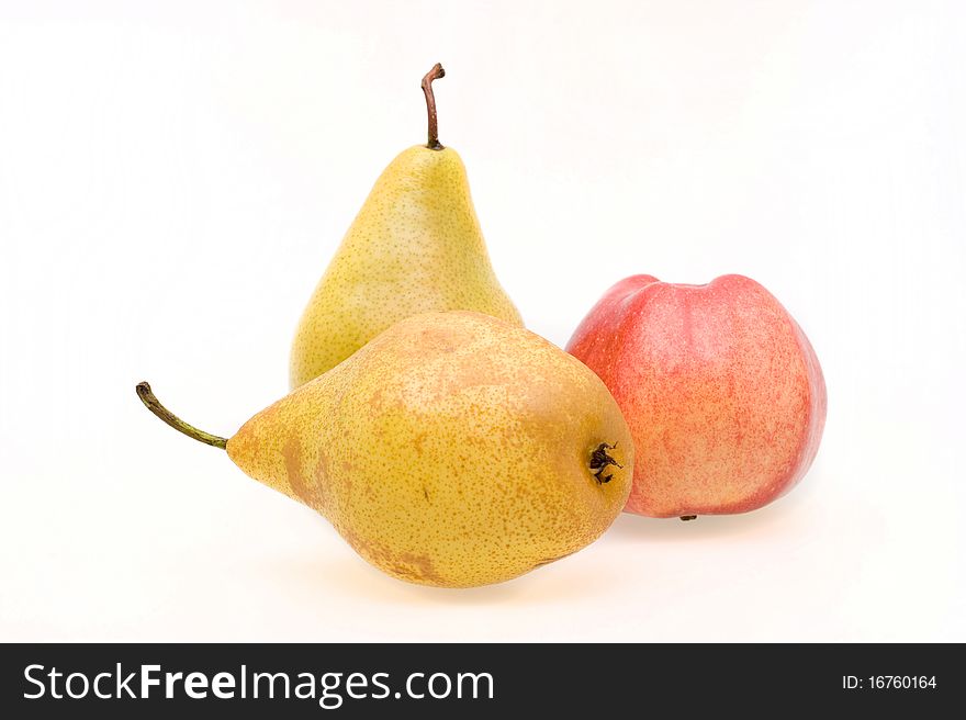 Fresh ripe apple and pears close-up on a white background. Fresh ripe apple and pears close-up on a white background