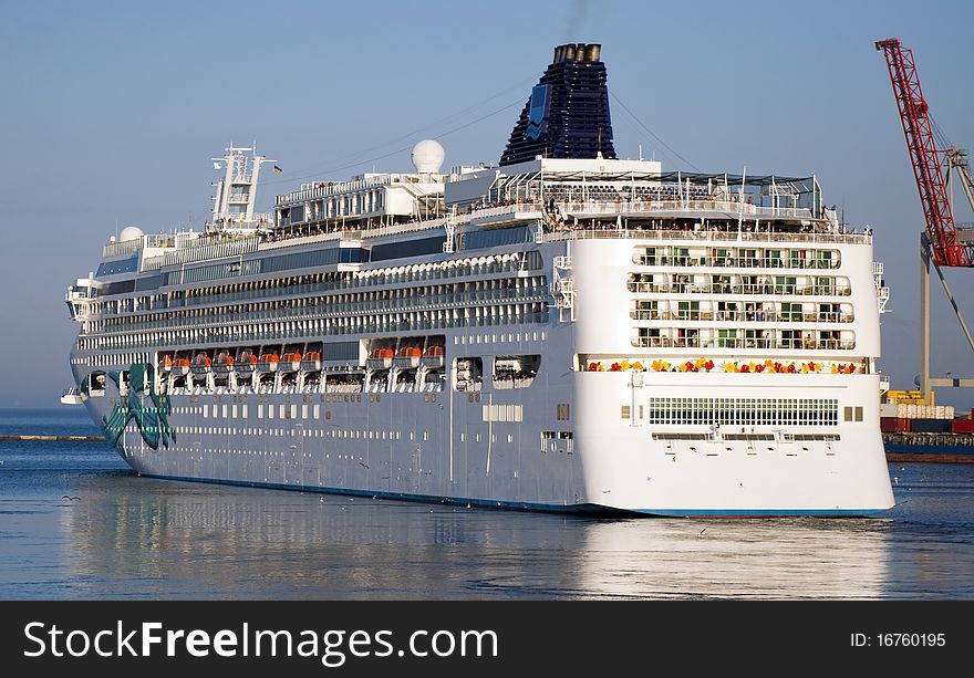 Large cruise liner leaving the port