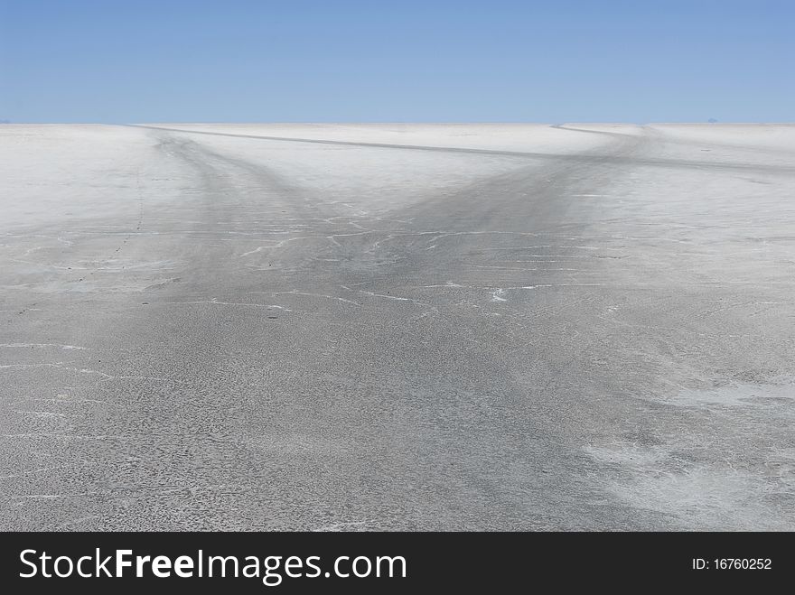 Tracks on the saltscape of salar de Uyuni, Bolivia. Tracks on the saltscape of salar de Uyuni, Bolivia