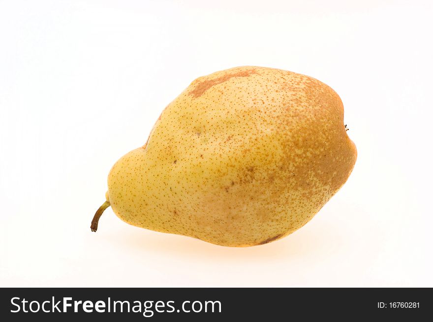 Fresh ripe pear close-up on a white background