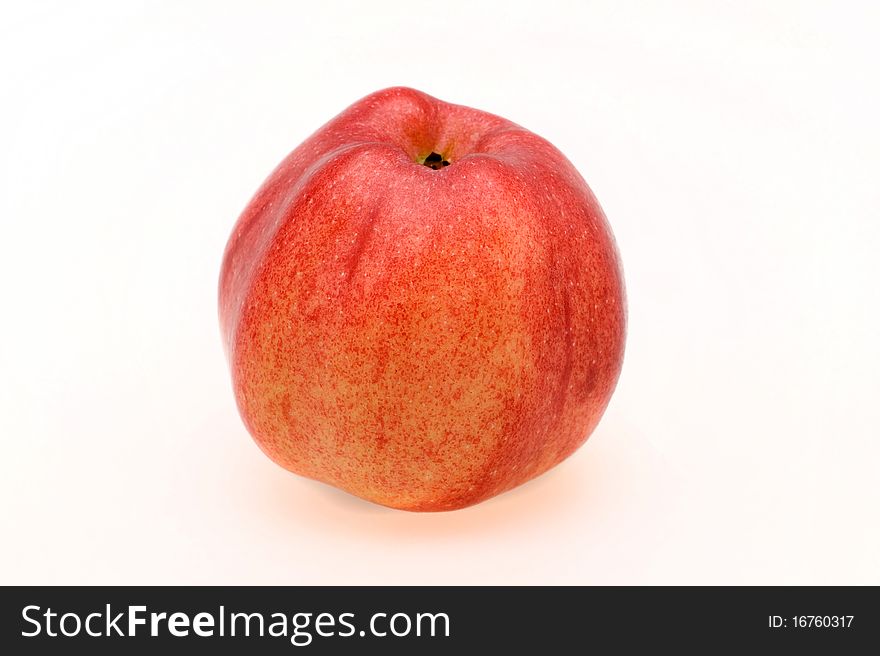 Fresh ripe apple close-up on a white background