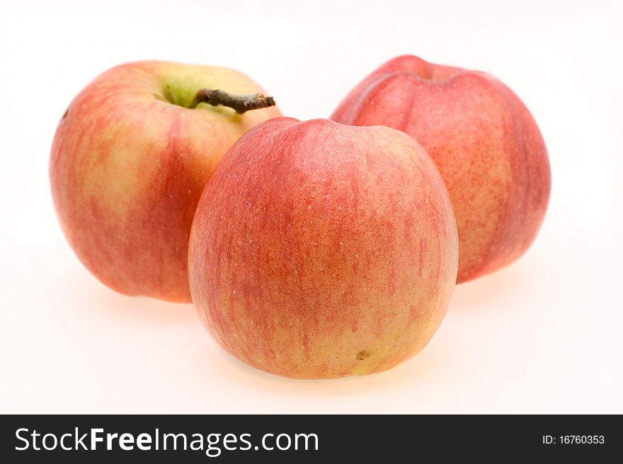 Fresh ripe apples close-up on a white background