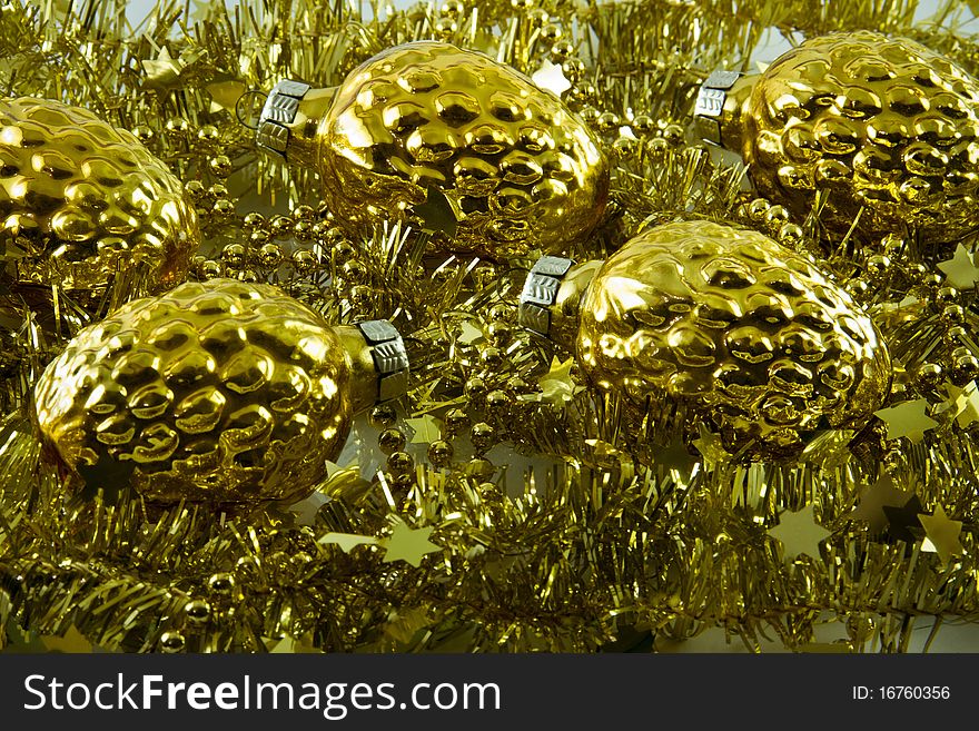 Golden garland and cones for New Year's tree decoration. Golden garland and cones for New Year's tree decoration