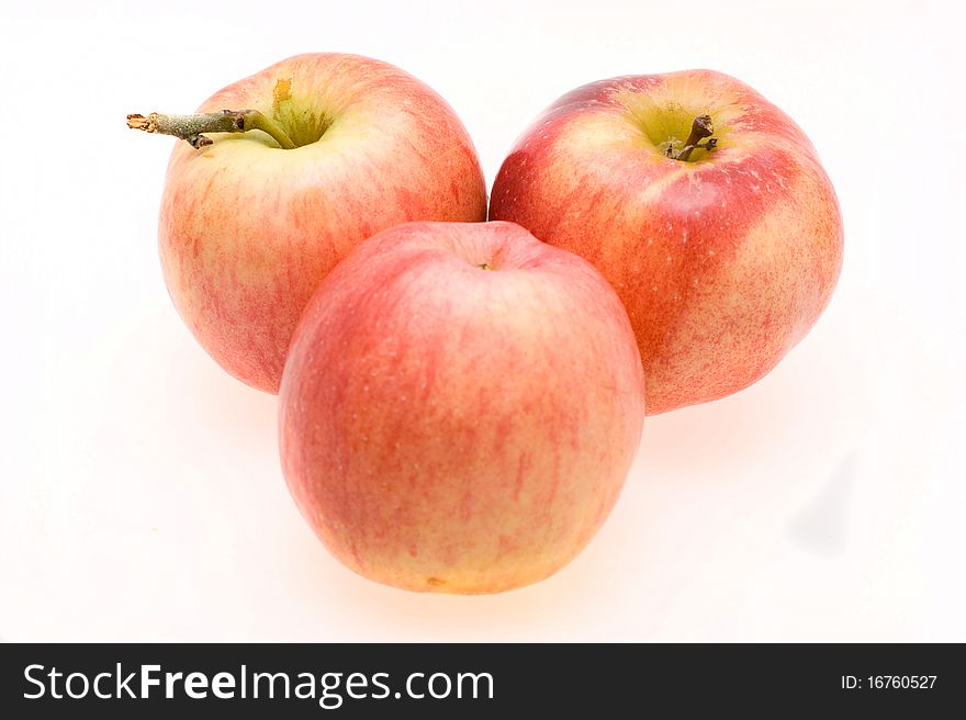 Fresh ripe apples close-up on a white background
