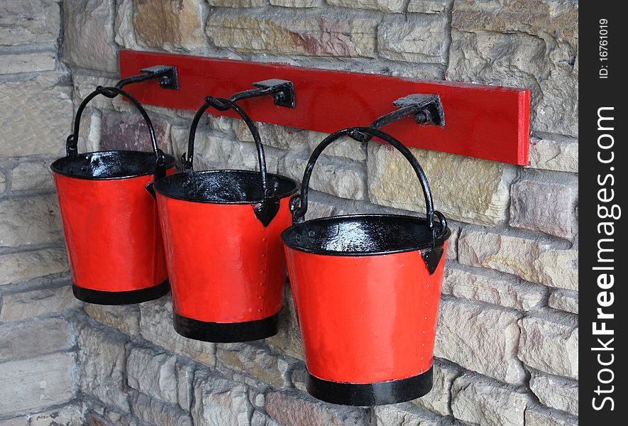A Set of Three Red Vintage Fire Sand Buckets. A Set of Three Red Vintage Fire Sand Buckets.