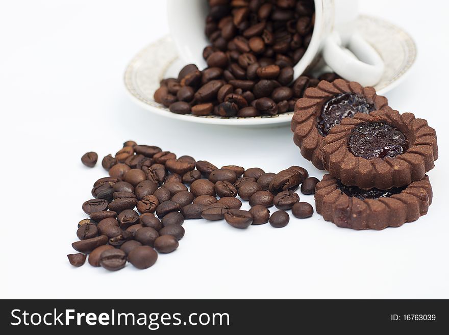 Coffee beans in shape of heart isolated in white