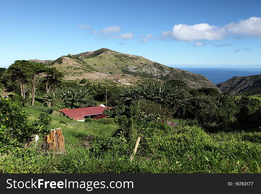 A country cottage tucked into the lush countryside of the Thompsons Wood district on a bright sunny day on St Helena Island. A country cottage tucked into the lush countryside of the Thompsons Wood district on a bright sunny day on St Helena Island.