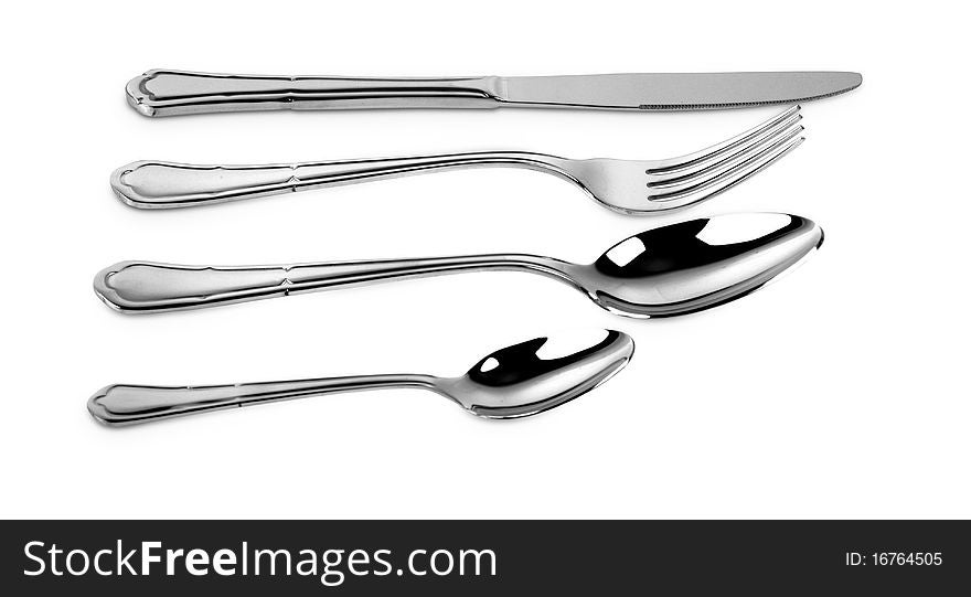 A knife, a fork, a spoon set. A knife, a fork, a spoon set