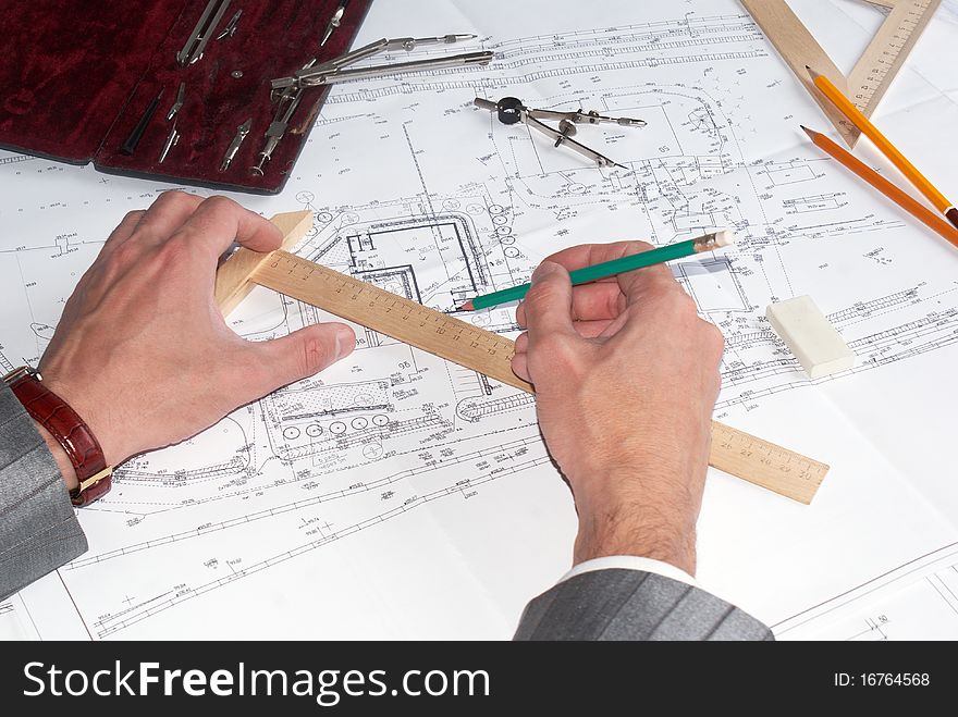 The of engineer-designer is carried out by construction plans. The of engineer-designer is carried out by construction plans