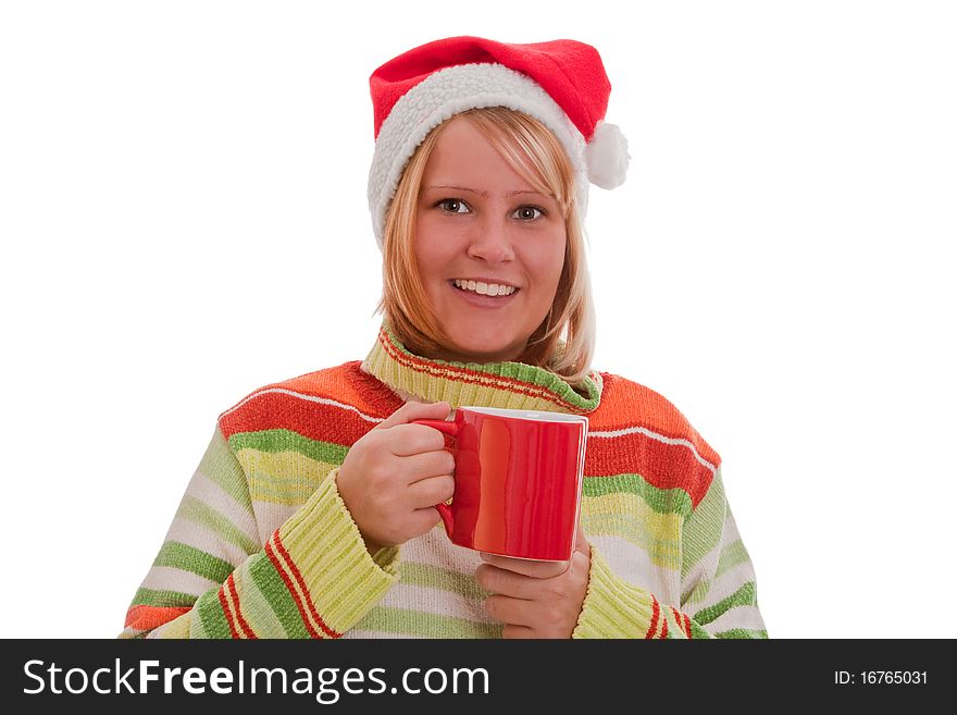 Young woman with santa hat holding a red cup - isolated. Young woman with santa hat holding a red cup - isolated