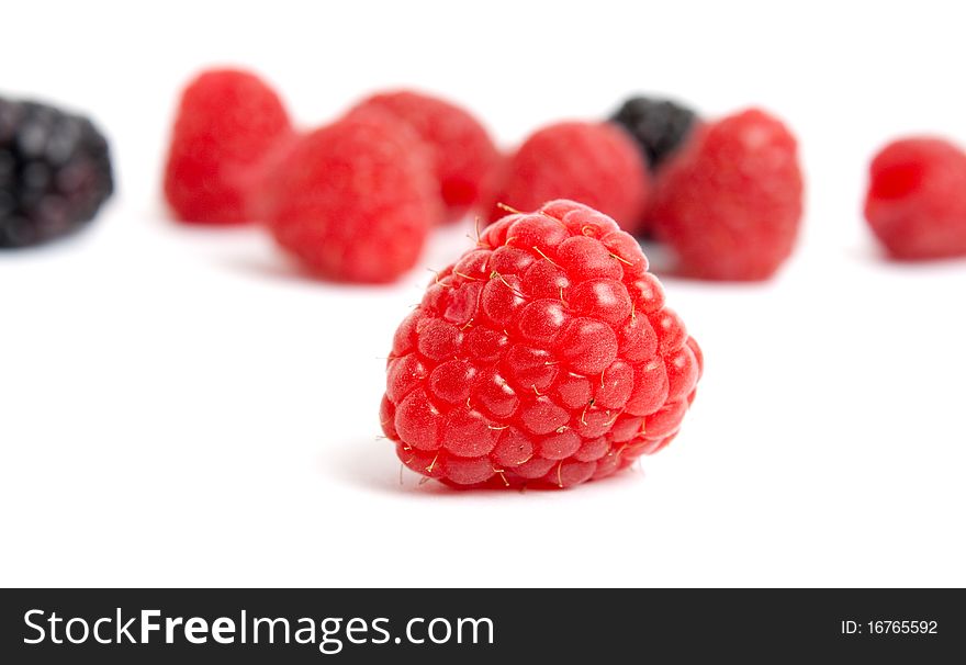 Red raspberry isolated on white. selective focus