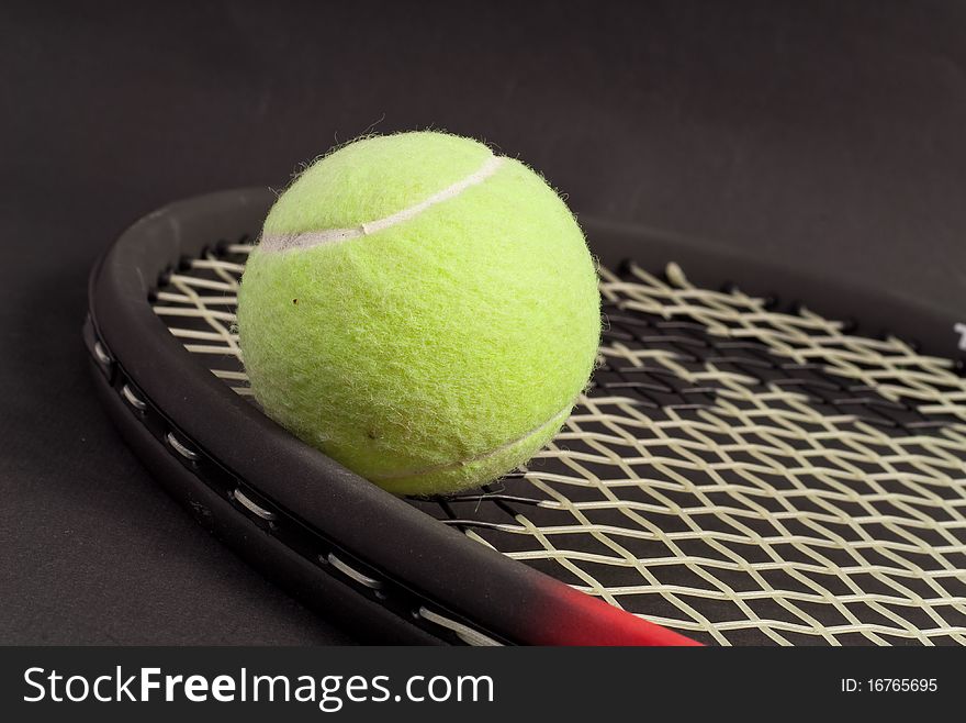 Tennis Concept Background With Ball On Racket