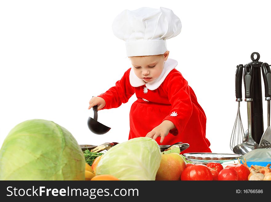 Portrait of a little girl in a cook cap. Isolated over white background.