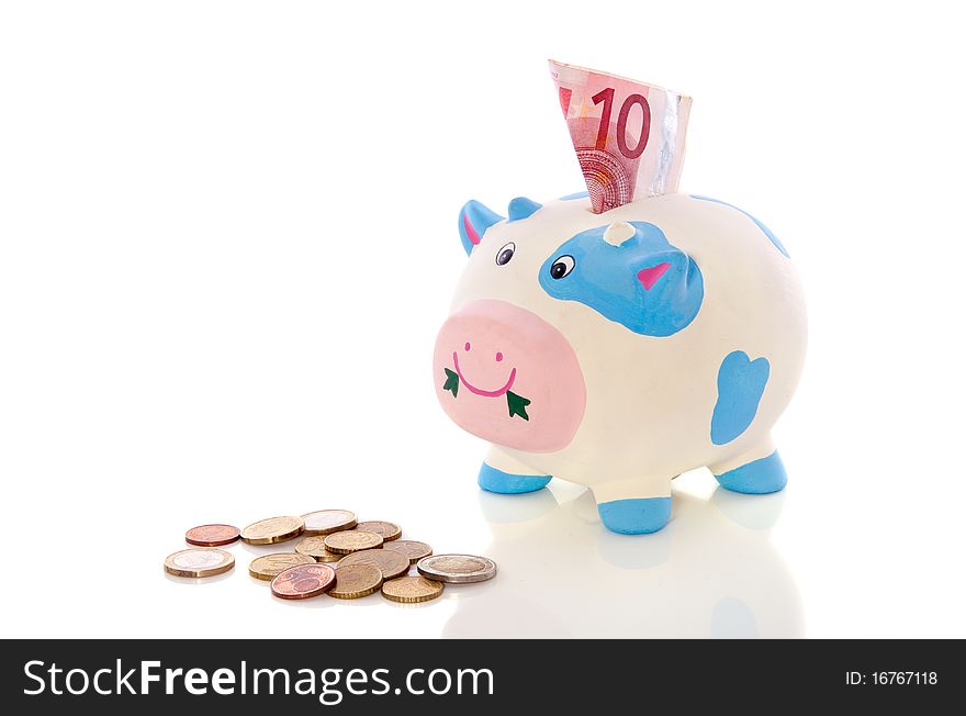 Colorful piggybank with euro coins isolated over white