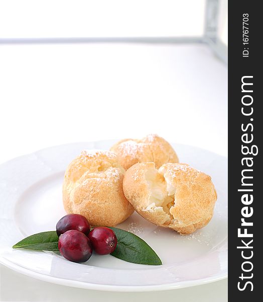Choux pastry filled with whipped cream, a simply perfect dessert for the holidays. Choux pastry filled with whipped cream, a simply perfect dessert for the holidays