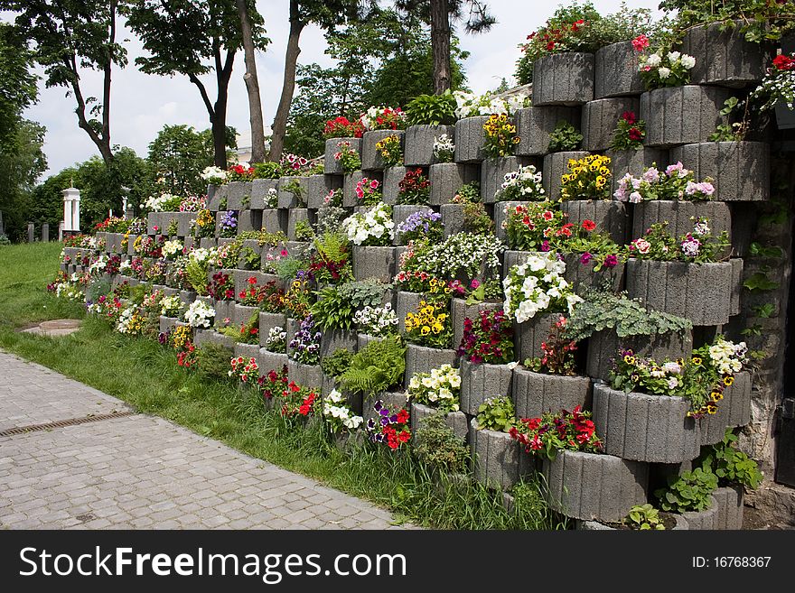 Beautiful many-tier floral flowerbed, Kamianets-Podilsky, Ukraine