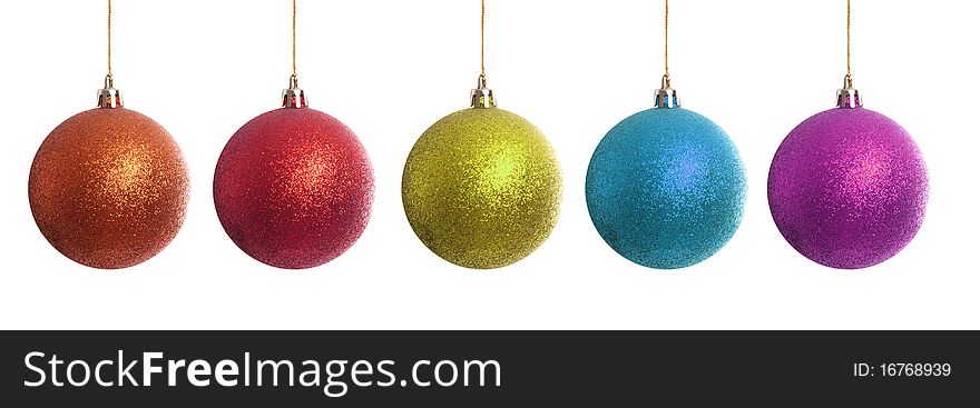 Orange, blue, red, green, blue, and purple Christmas balls isolated on white. Orange, blue, red, green, blue, and purple Christmas balls isolated on white
