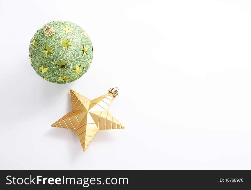 Christmas card with green ball and a star over white background. Christmas card with green ball and a star over white background