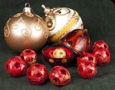 Open Red Ornament With Gold Ball Stock Photos