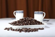 Display Of Roasted Coffee Beans With Two Cups Stock Photo Display Of Roasted Coffee Beans With Two Cups Stock Photo