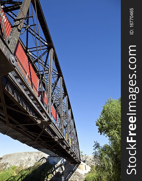 Low angle view of a cargo train bridge. Low angle view of a cargo train bridge