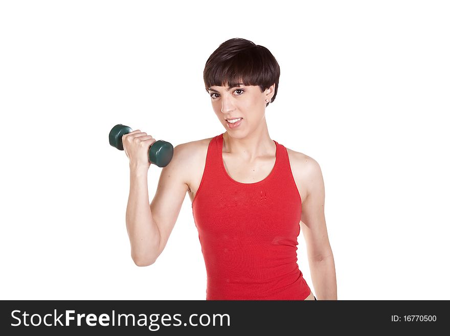 A close up of a woman holding a weight with a happy expression on her face. A close up of a woman holding a weight with a happy expression on her face.