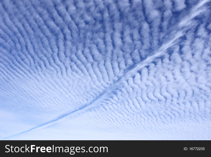 Airplane path through unique cloudy sky. Airplane path through unique cloudy sky