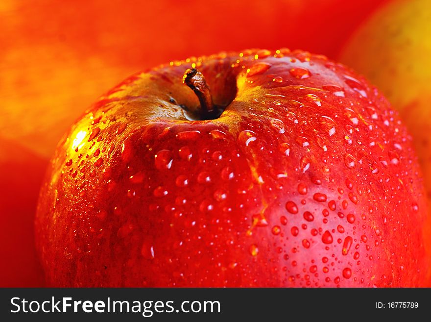 Fresh apple with water drops