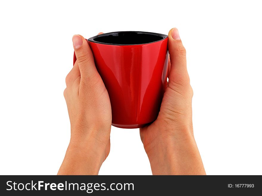 Red cup in hand on white background