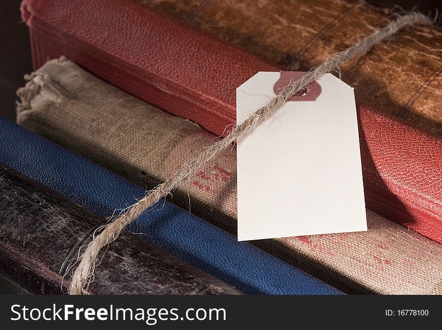 Archival documents in a book-depository are tied up by a cord. Archival documents in a book-depository are tied up by a cord.