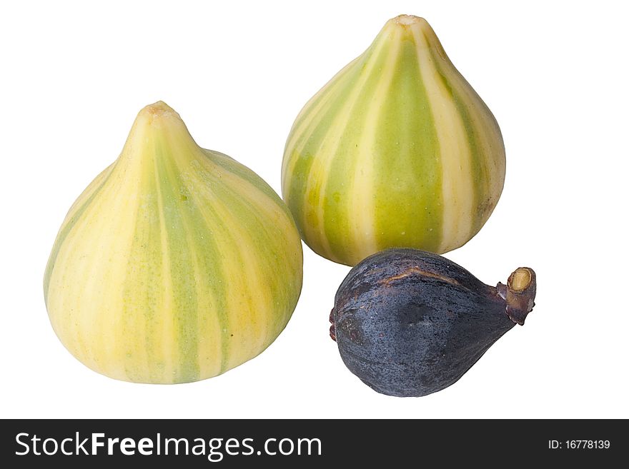 Ripe fruits of a fig on a white surface.