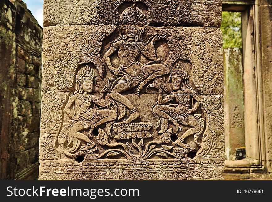 Apsara carved on the stone at bayon