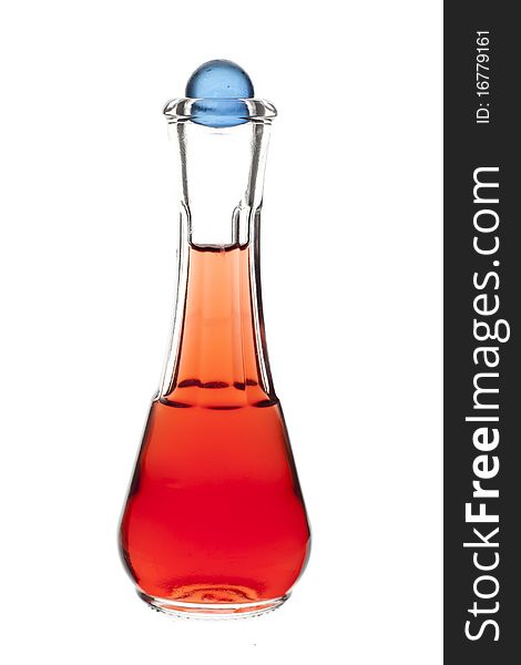 Laboratory glassware filled with a red liquid