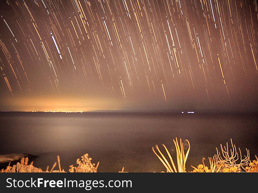 Star Trails like Falling stars over a neil island