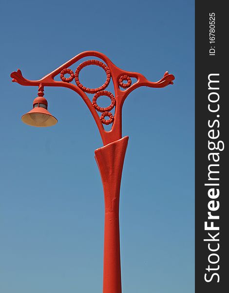 Isolated vintage streetlamp on a blue sky