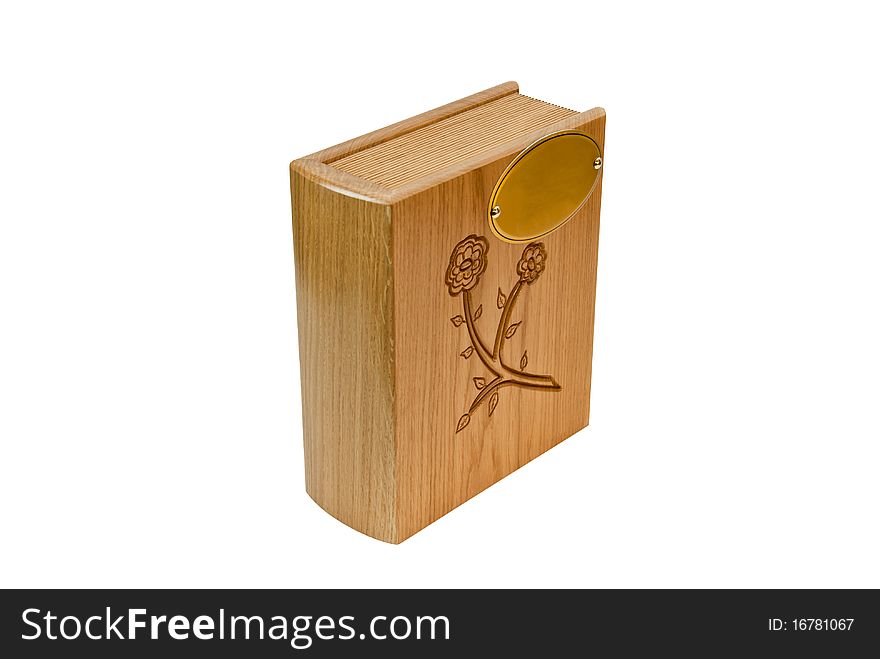 Book with brown wooden sculpture. Book with brown wooden sculpture