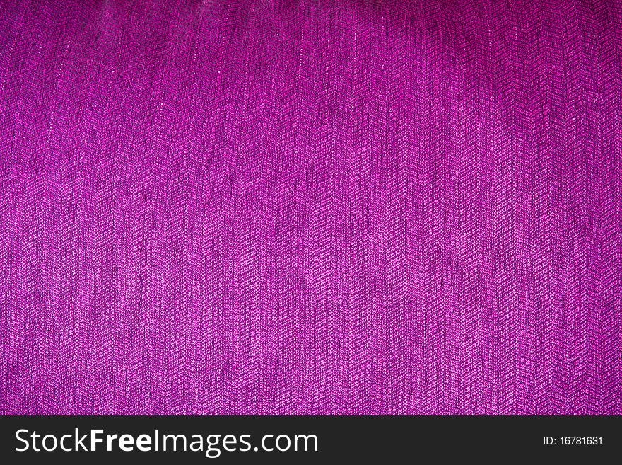 Violet trellised texture of fabric in terms of the macro. Violet trellised texture of fabric in terms of the macro