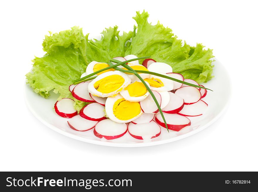 Salad of radish and eggs isolated on white