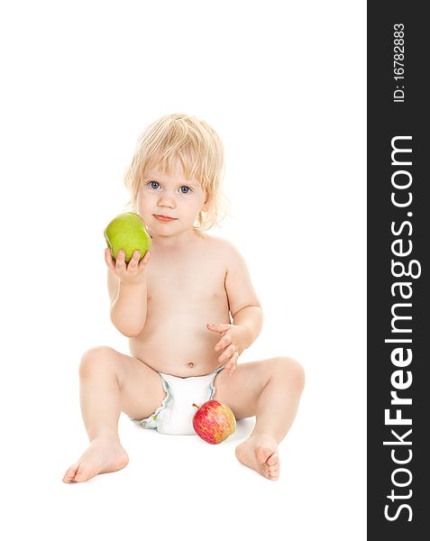 Sweet baby girl holding a green apple isolated on white