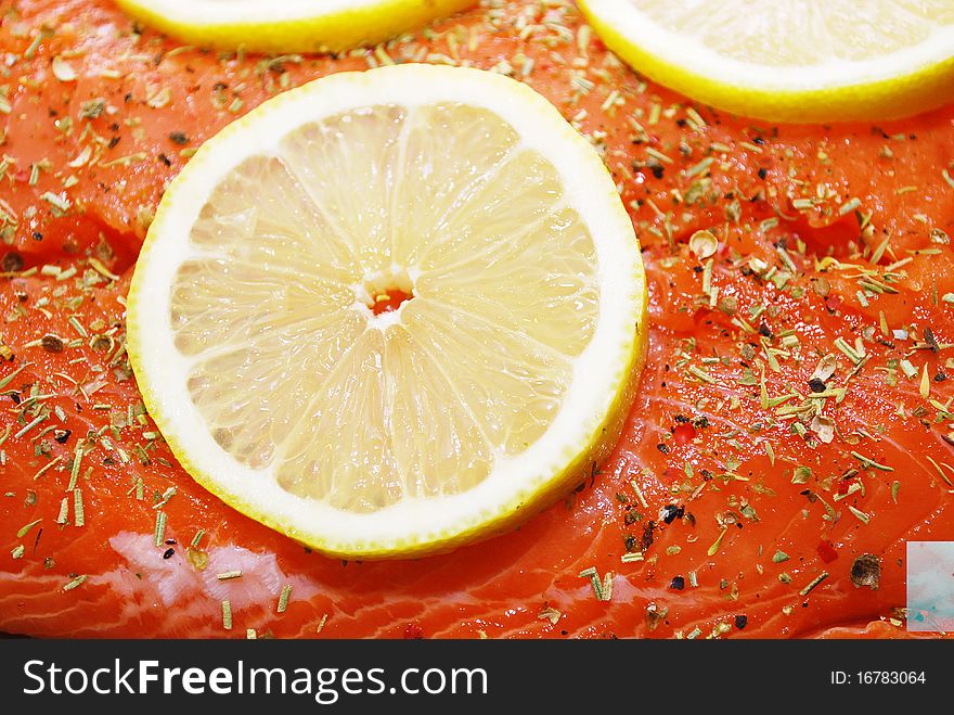 Salmon with lemon food background closeup shoot.