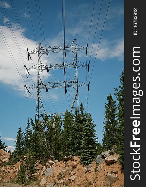 A high power electrical tower in the Colorado Rocky Mountains. A high power electrical tower in the Colorado Rocky Mountains