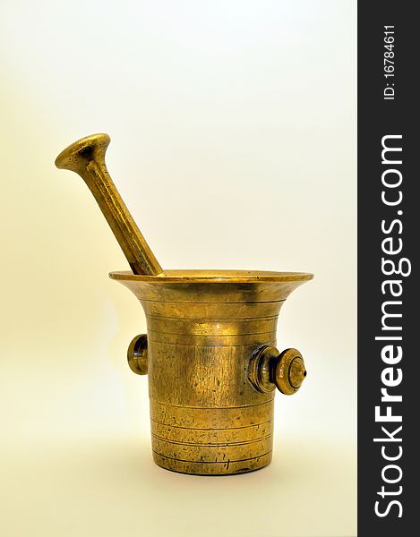 Old brass mortar with pestle