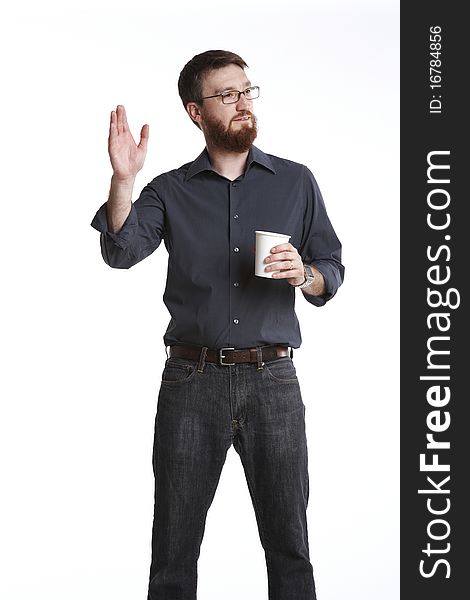 Bearded man standing against white background holding a coffee cup waving. Bearded man standing against white background holding a coffee cup waving