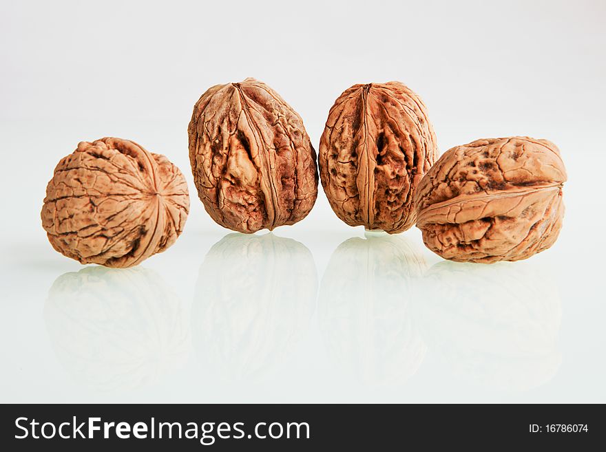 Organic walnut group isolated on white background. Organic walnut group isolated on white background.