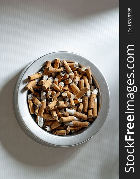 Ashtray full of cigarette butts