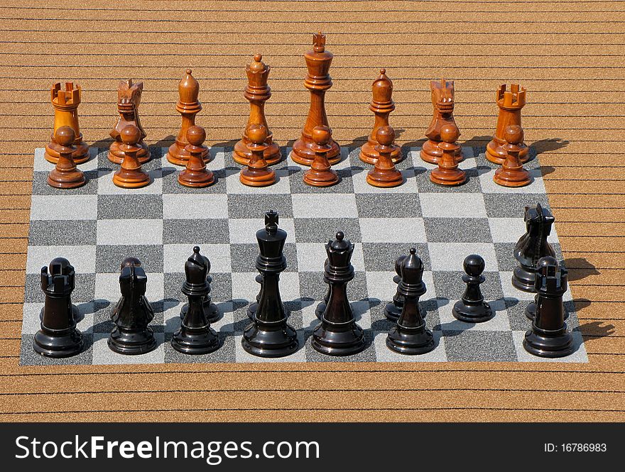 Big Wooden Chess, arranged on start positions for adult to play outside