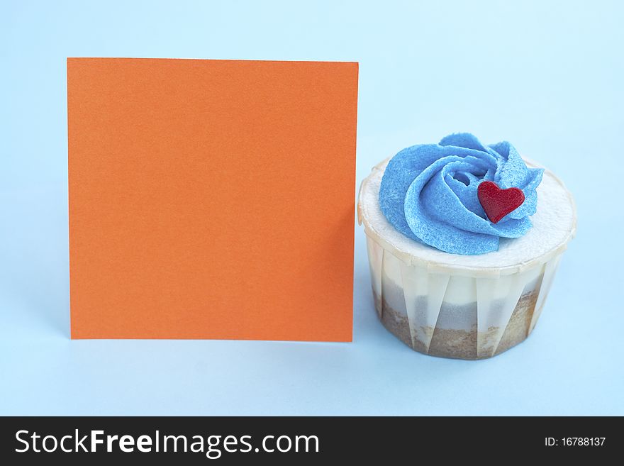 Love Cupcake and Orange Note Pad with Blue Background