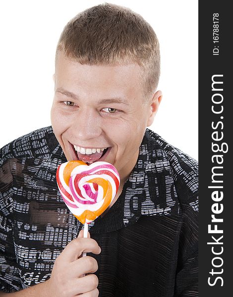 The young manl is going to eat a lollypop. The young manl is going to eat a lollypop