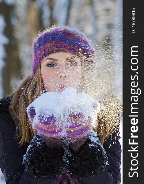 Portrait of beautiful adult girl outdoor in winter