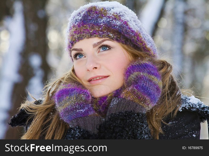 Portrait of sniling girl with snow